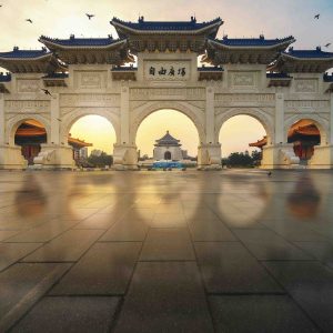 Early morning at the Archway of CKS (Chiang Kai Shek) Memorial Hall, Tapiei, Taiwan. The meaning of the Chinese text on the archway is "Liberty Square".
